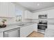 Bright kitchen showcasing stainless steel appliances, white cabinets and granite countertops at 238 Christiana Ln. # C, Myrtle Beach, SC 29579