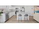 Modern kitchen features stainless appliances, granite countertops, and center island with bar stool seating at 238 Christiana Ln. # C, Myrtle Beach, SC 29579