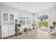 Bright living area with view of exterior, stylish cat tree, and lots of natural light at 238 Christiana Ln. # C, Myrtle Beach, SC 29579