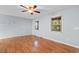 Bright bedroom with two windows, hardwood floors, and a ceiling fan at 238 Stonebrook Dr., Myrtle Beach, SC 29588
