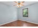 Bedroom featuring laminate floors, a ceiling fan, and a bright window for natural lighting at 238 Stonebrook Dr., Myrtle Beach, SC 29588
