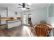 Dining area, with light-aqua colored walls, seamlessly connected to the kitchen at 238 Stonebrook Dr., Myrtle Beach, SC 29588
