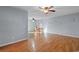 Open-concept living space with hardwood floors, a ceiling fan, and neutral paint at 238 Stonebrook Dr., Myrtle Beach, SC 29588