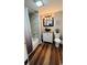 Modern bathroom featuring wood-look flooring, updated vanity, stylish fixtures, and tub/shower combo at 2419 Hilton Dr., North Myrtle Beach, SC 29582