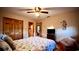 Relaxing bedroom featuring wood floors, a comfortable bed, and a seating area at 2419 Hilton Dr., North Myrtle Beach, SC 29582