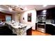Close up of modern kitchen island with granite countertops and stainless steel appliances at 2419 Hilton Dr., North Myrtle Beach, SC 29582