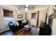 Cozy living room featuring a comfortable couch and hardwood floors at 2419 Hilton Dr., North Myrtle Beach, SC 29582