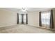 Spacious bedroom featuring plush carpet, neutral walls, and lots of natural light from multiple windows at 263 Walden Lake Rd., Conway, SC 29526