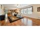 Bright living space with hardwood floors, comfortable seating, and an open view to the kitchen at 263 Walden Lake Rd., Conway, SC 29526