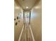 Hallway featuring beautiful wood-look floors and fun turtle decals on the wall at 3000 N Ocean Blvd. # 1406, Myrtle Beach, SC 29572
