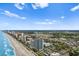 Aerial view of the oceanfront resort and the coastline, showing the beautiful beach and surrounding city at 3000 N Ocean Blvd. # 333, Myrtle Beach, SC 29577