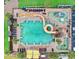 Aerial view of resort-style outdoor pool and water park with lounge area at 3000 N Ocean Blvd. # 333, Myrtle Beach, SC 29577