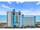 Stunning exterior of an oceanfront high rise building with a view of the beach and the ocean at 3000 N Ocean Blvd. # 333, Myrtle Beach, SC 29577