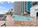 Resort-style outdoor pool with comfortable lounge chairs and building views at 3000 N Ocean Blvd. # 333, Myrtle Beach, SC 29577