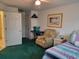 Bedroom with a relaxing chair and convenient bedside table at 330 S Middleton Dr. # 603, Calabash, NC 28467