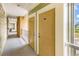 Exterior building hallway with unit entrance doors and a glimpse of neighborhood at 35 Delray Dr. # 3A, Murrells Inlet, SC 29576