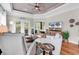 Cozy living room with modern decor, comfortable seating, and a view to a screened porch at 35 Delray Dr. # 3A, Murrells Inlet, SC 29576