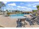 Beautiful outdoor pool area with lounge chairs and a covered cabana for relaxing and entertaining at 35 Delray Dr. # 3A, Murrells Inlet, SC 29576