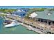 Waterfront restaurant and bar with outdoor seating along the docks and marina at 35 Delray Dr. # 3A, Murrells Inlet, SC 29576