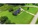 Home with expansive green lawn, storage shed, and proximity to the roadway at 3511 Sumpter Rd., Loris, SC 29569