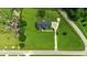 Bird's-eye view of a home with a spacious lawn, long driveway, and storage shed at 3511 Sumpter Rd., Loris, SC 29569