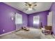 Bedroom with purple walls and natural light from the windows at 3511 Sumpter Rd., Loris, SC 29569