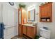 Bathroom with vanity, mirror, and adjacent toilet at 356 Lakeside Crossing Dr., Conway, SC 29526