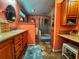 This bathroom is painted peach and contains a glass-enclosed shower and ample cabinet space at 356 Lakeside Crossing Dr., Conway, SC 29526