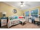 Bright bedroom featuring a daybed with decorative pillows, natural light, and a workspace at 356 Lakeside Crossing Dr., Conway, SC 29526