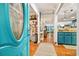 Inviting foyer with a beautiful blue door leading into an open-concept living space at 356 Lakeside Crossing Dr., Conway, SC 29526