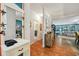 Inviting hallway with wood floors, neutral paint, and stylish decor at 356 Lakeside Crossing Dr., Conway, SC 29526