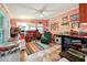 Bright home office with multiple workstations, cat tree, and colorful decor accents at 356 Lakeside Crossing Dr., Conway, SC 29526