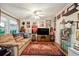 Cozy living room featuring a comfortable sofa, patterned rug, and an array of decorative items at 356 Lakeside Crossing Dr., Conway, SC 29526