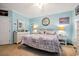 Comfortable main bedroom featuring light blue walls, a ceiling fan, and white furniture at 356 Lakeside Crossing Dr., Conway, SC 29526