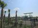 Playground with swings and slides in a community setting at 3575 Ashridge Way, Conway, SC 29526