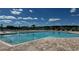 A refreshing community pool with brick deck and lounge chairs offers a relaxing outdoor experience at 3575 Ashridge Way, Conway, SC 29526
