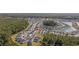 An aerial view displaying the home's placement in the neighborhood, backing up to a nature preserve at 4206 Falls Oaks St., Myrtle Beach, SC 29579