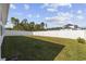 A spacious, fenced backyard with a large green lawn, perfect for outdoor activities at 4206 Falls Oaks St., Myrtle Beach, SC 29579