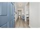 Inviting entryway with hardwood floors, elegant lighting, and stylish decor at 4206 Falls Oaks St., Myrtle Beach, SC 29579