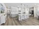 Modern kitchen with stainless steel appliances, gray cabinetry, and an island with seating at 4206 Falls Oaks St., Myrtle Beach, SC 29579