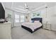 Stylishly appointed bedroom with tray ceiling, large window, and an accent wall at 4206 Falls Oaks St., Myrtle Beach, SC 29579