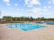 Gorgeous pool area with a lake view and comfortable deck. Perfect for enjoying time in the sun at 4206 Falls Oaks St., Myrtle Beach, SC 29579