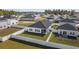Aerial view of the backyard featuring a privacy fence, manicured lawn and covered porch at 4206 Falls Oaks St., Myrtle Beach, SC 29579