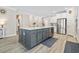 Modern kitchen with stainless steel appliances, a large center island and hardwood floors at 432 Rose Fountain Dr., Myrtle Beach, SC 29579