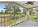 Balcony view of a lush golf course and a small river running through the community at 4767 Wild Iris Dr. # 203, Myrtle Beach, SC 29579