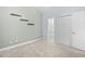 Light-filled bedroom with closet and view to en-suite bathroom at 4767 Wild Iris Dr. # 203, Myrtle Beach, SC 29579