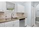 Close-up of the kitchen with a stainless steel sink and modern appliances at 4767 Wild Iris Dr. # 203, Myrtle Beach, SC 29579