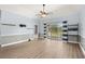 Large, bright living room with sliding door access and stylish flooring at 4767 Wild Iris Dr. # 203, Myrtle Beach, SC 29579