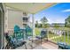 Cozy balcony with outdoor seating, perfect for enjoying the fresh air and views of the surrounding property at 4890 Luster Leaf Circle # 201, Myrtle Beach, SC 29577