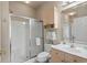 Functional bathroom with a glass-enclosed shower, single vanity, and essential storage at 4890 Luster Leaf Circle # 201, Myrtle Beach, SC 29577